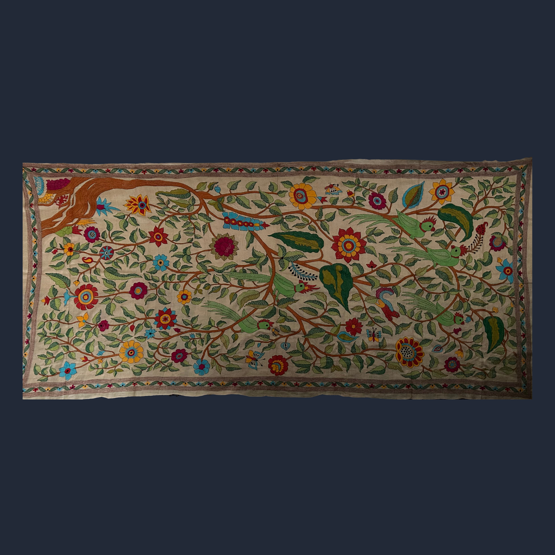 Beautiful Nakshi Kantha tapestry in Tussar silk with forest prints.