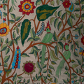 Elegant handcrafted wall-hanging tapestry with forest elements.