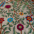 Vibrant and colorful Nakshi Kantha Tussar silk tapestry with forest design.
