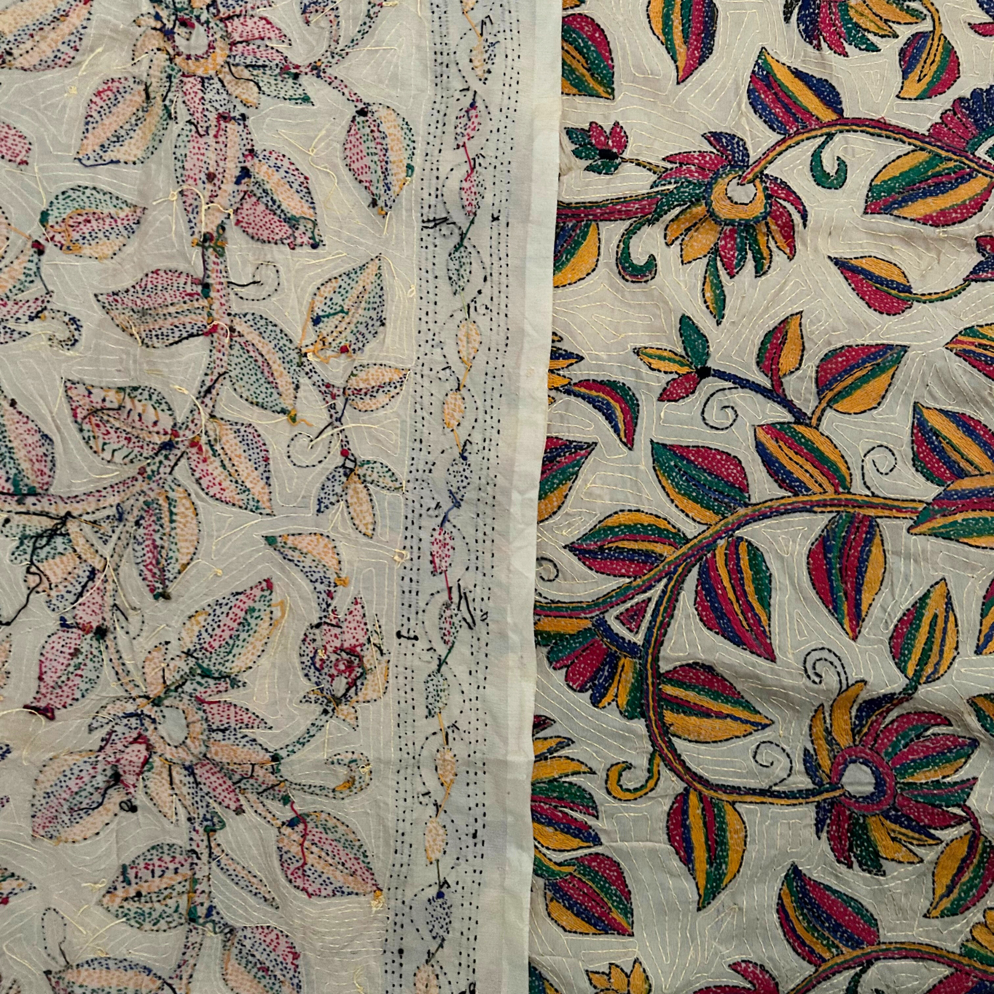 Garden-inspired handcrafted silk tapestry decor.