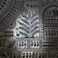 Handcrafted black and white Pattachitra wall hanging with Warli art.