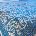 Handcrafted reversible cotton quilt floral blue elephant border.