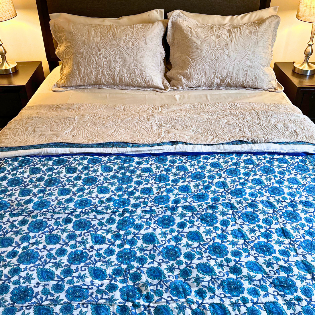 Handcrafted Jaipuri reversible cotton quilt for all-season comfort.