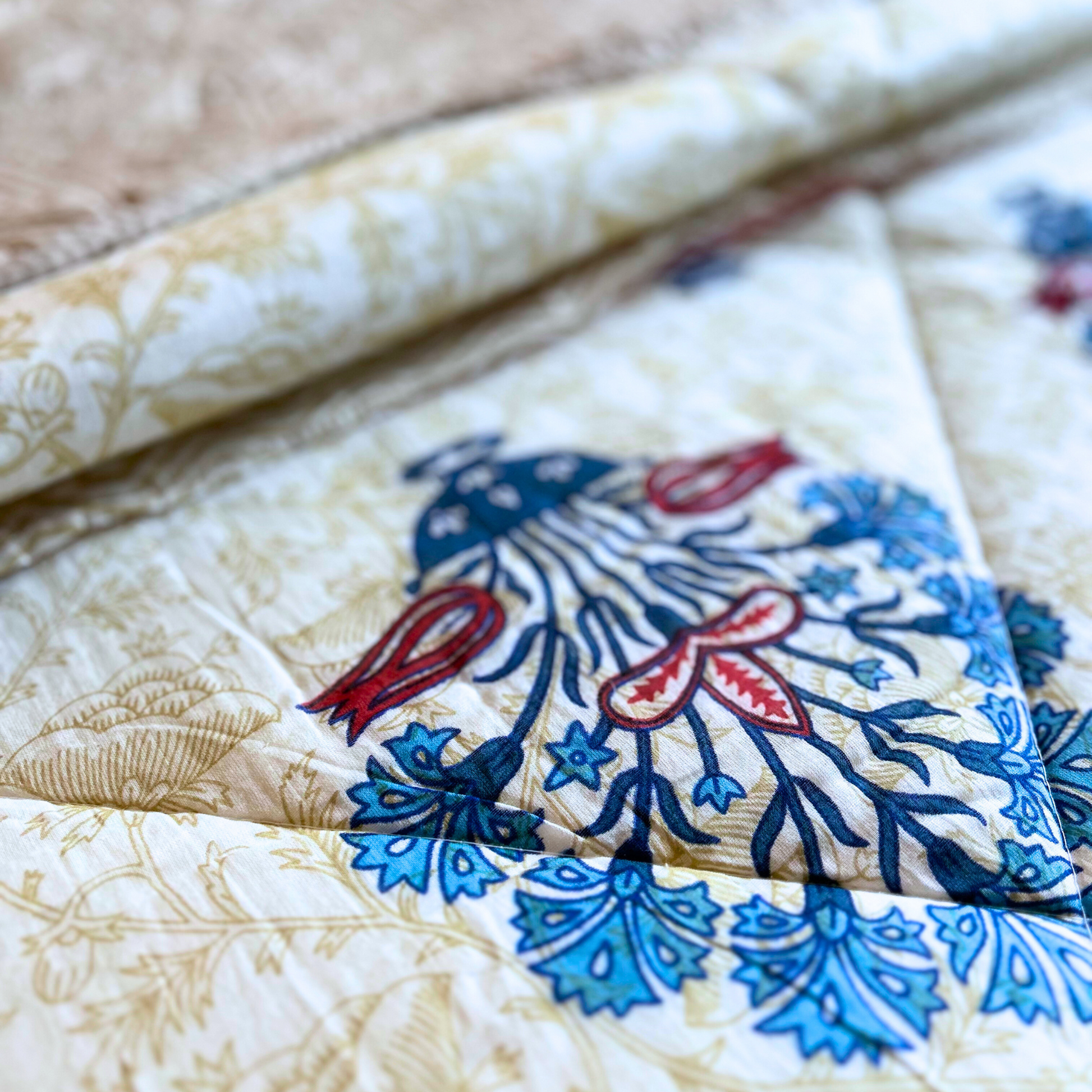 Handcrafted Jaipuri quilt in breathable, reversible cotton.