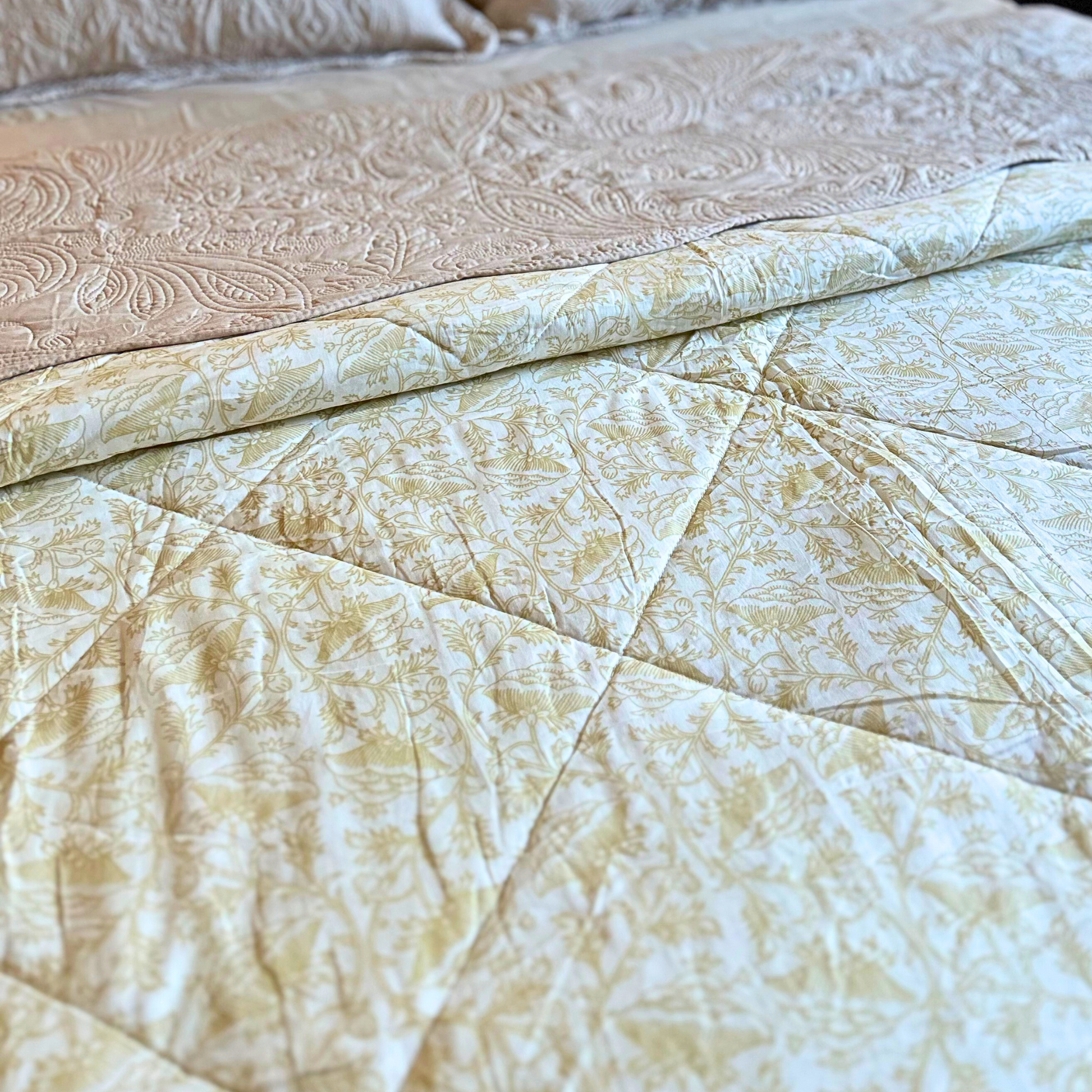 Classic handcrafted cotton quilt with a Jaipuri pattern.