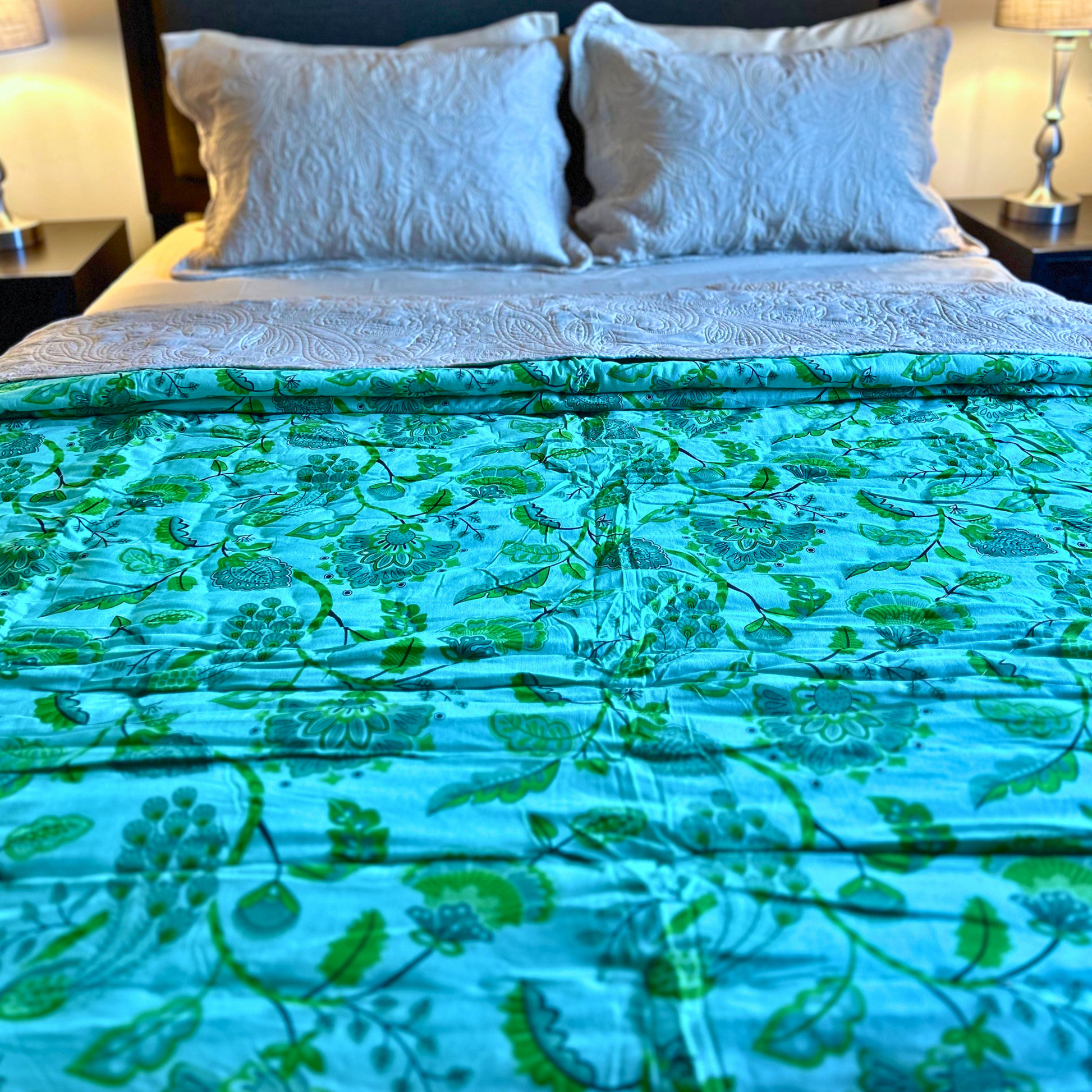 Stylish parrot green Jaipuri quilt in reversible cotton.