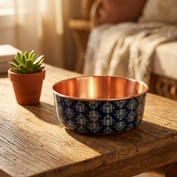 DAMASK hand-hammered copper pet water bowl with navy damask pattern on a wooden table