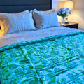 Jaipuri block print reversible cotton quilt in parrot green.