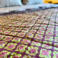 Cozy reversible cotton quilt with elegant floral patterns.