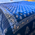 Deep blue reversible Jaipuri cotton quilt.