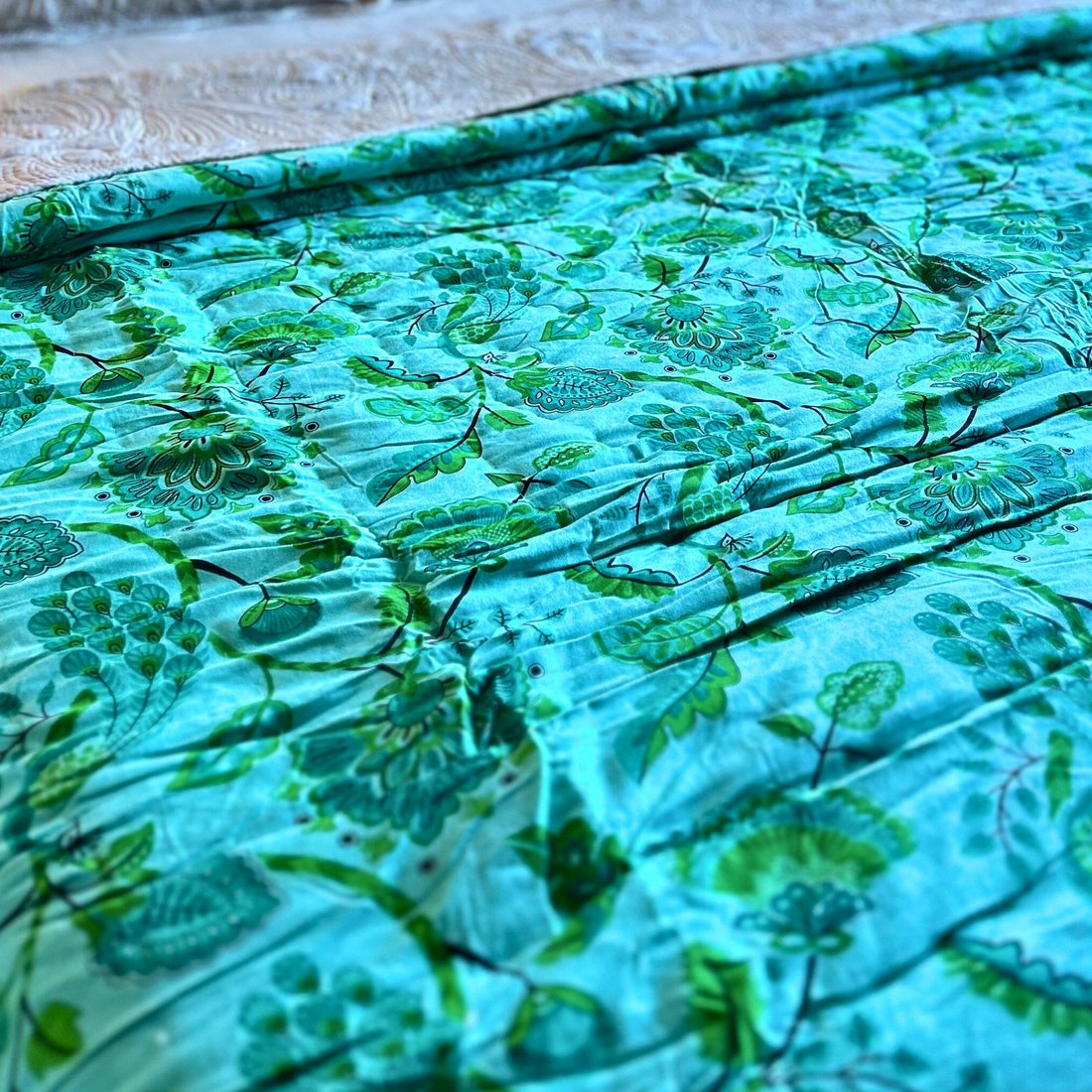 Jaipuri block print reversible cotton quilt in parrot green.