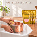 Perfect Polish 3-pack powerful yet gentle copper cleaner removing tarnish from a hammered copper pet bowl