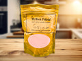 Perfect Polish multi-metal cleaning powder packaging on a wooden surface with a blurred kitchen background