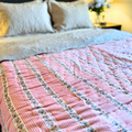 Handcrafted reversible Jaipuri floral cotton quilt.