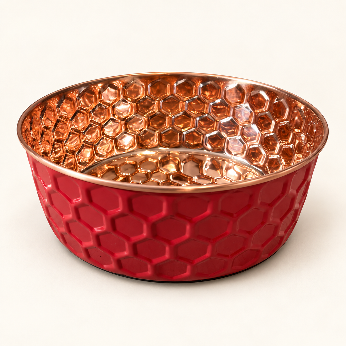 RUBY pink diamond-hammered copper pet bowl with polished copper interior, studio shot on a cream background