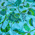 Vibrant parrot green cotton quilt, Jaipuri block print.