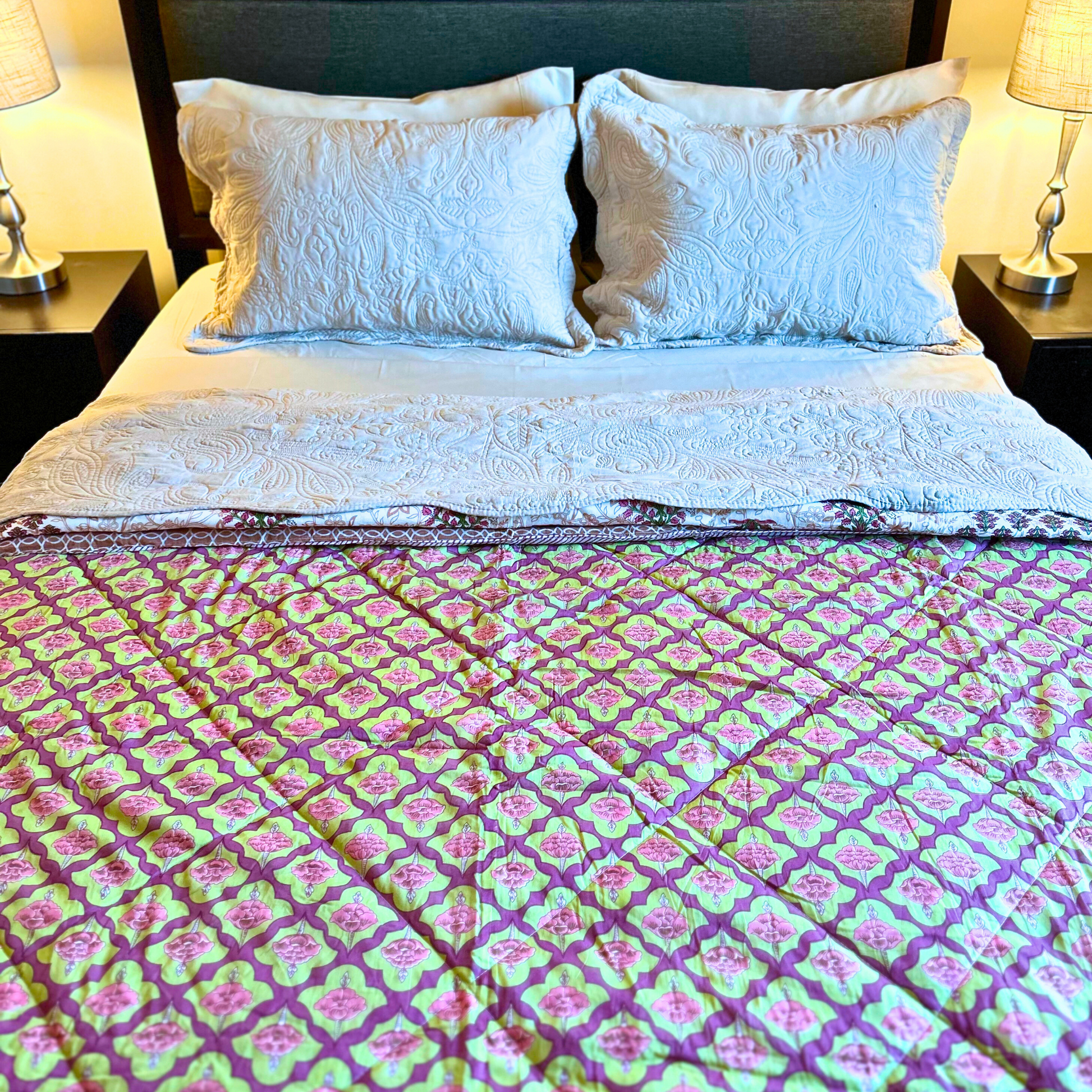 Beautiful Jaipuri cotton quilt featuring floral prints.